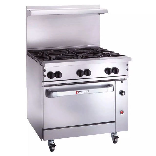 A commercial restaurant range featuring stainless steel construction, four gas burners, a spacious oven, front control knobs, and the Wolf logo. It includes casters for mobility and a backsplash with a shelf above the burners.