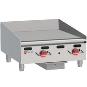 A heavy duty commercial griddle with stainless steel countertop design, two red control knobs, raised sides and backsplash, and sturdy short legs. The Wolf brand logo is displayed on the front left side of this reliable appliance.