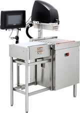 A Hobart stainless steel industrial checkweigher machine features durable stainless steel construction, a display screen on the left, center conveyor belt, right control buttons, and is set on a metal frame with visible wiring and warning labels.