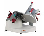 A commercial Berkel X13AE-PLUS Premium Food Slicer featuring a slanted 13" stainless steel knife, red and gray handles, control buttons, and safety guards. The slicer is angled to display its sharp blade and adjustable thickness guide.