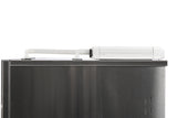 A close-up of the top of a Scotsman stainless steel appliance with a white, rectangular device attached via white brackets, set against a plain background. The device, used in modular cube ice machines, appears to have an extendable or adjustable arm.