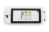 A rectangular white electronic device with a black frame surrounds a central label printed with barcodes, warning symbols, certifications, and technical information. Ideal for Scotsman modular cube ice machines or XSafe Sanitation System, it features rounded edges and metal ports on one side.