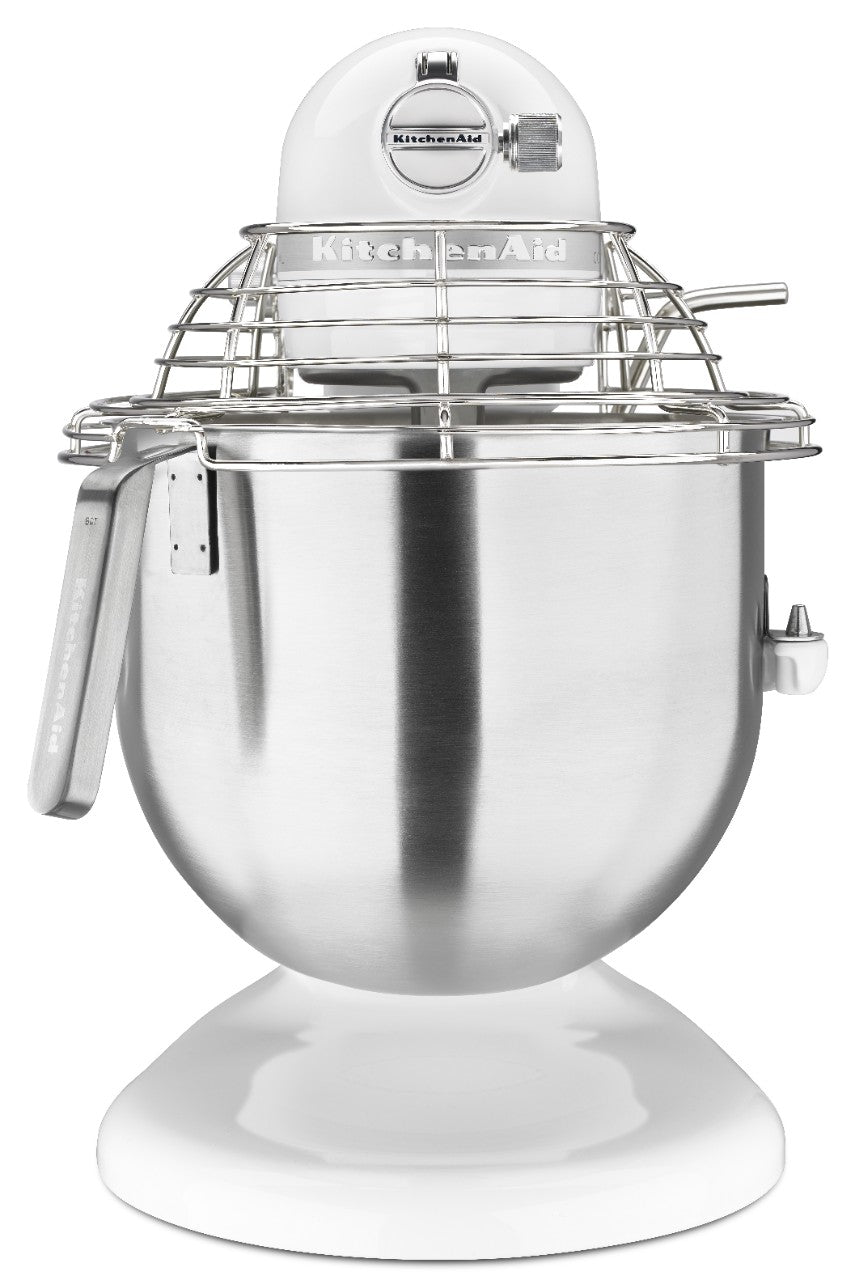A white KitchenAid Commercial Stand Mixer with an 8 quart stainless steel mixing bowl and a metal wire safety guard. Featuring a tilt-head design, left lever, and resting on a sturdy white base, it delivers reliable performance for any kitchen.