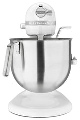 A white KitchenAid Commercial Stand Mixer with an 8 quart bowl, stainless steel mixing bowl, side handle, and metal attachment on top. The mixer sits on a white base with a metal lever and knob visible on the side.