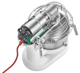 A KitchenAid Commercial Stand Mixer with its top half open reveals an exposed motor, circuit board, wiring, and gears. The 8 quart bowl and wire whisk attachment are below; the device has a red power cord and sits on a white base.
