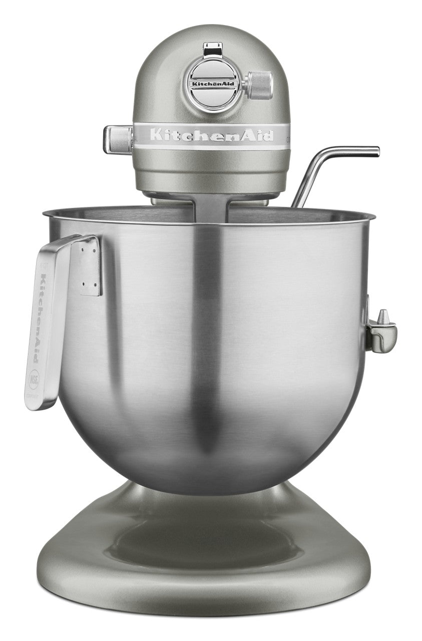 A metallic silver KitchenAid Commercial Stand Mixer with an 8 quart bowl and a sturdy handle. The mixer head bears the KitchenAid logo, while a metal mixing attachment sits inside the spacious stainless steel bowl.