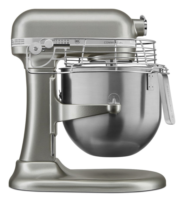 A metallic silver KitchenAid Commercial Stand Mixer with an 8 quart bowl, wire safety guard, and control knob on the side. This sturdy mixer features PowerCore technology and commercial-grade labeling near the top front.