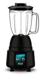 A black commercial blender with a clear 44-oz capacity polycarbonate container, handle, and lid. The base features two round control dials, a blue NuBlend logo, and the Waring brand name. The blender is shown against a plain white background.