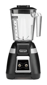 A black and silver Waring Commercial Blade Bar Blender with a clear, marked 48-oz. plastic container sits upright. The 2-speed front panel has switches labeled Off, Low, and Pulse. The brand name appears on both the pitcher and the base above the controls.