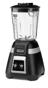 A black and silver Waring Commercial Blade Bar Blender features a 2-speed control with "HI," "LOW," and "PULSE" switches. It includes a clear 48-oz. plastic container with measurement markings, handle, and lid, all set against a white background.
