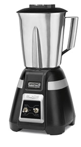 A stainless steel bar blender with a large stainless steel container, sturdy handle, black base, and control knobs. The Waring Commercial brand is labeled above switches for low, high, and pulse settings—ideal for international use.