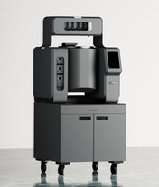 BOTINKIT Omni Auto-Pan commercial cooking system with touchscreen interface, built-in cast iron pot, automated dispensing units, and caster base for mobility—designed for high-efficiency restaurant kitchens.