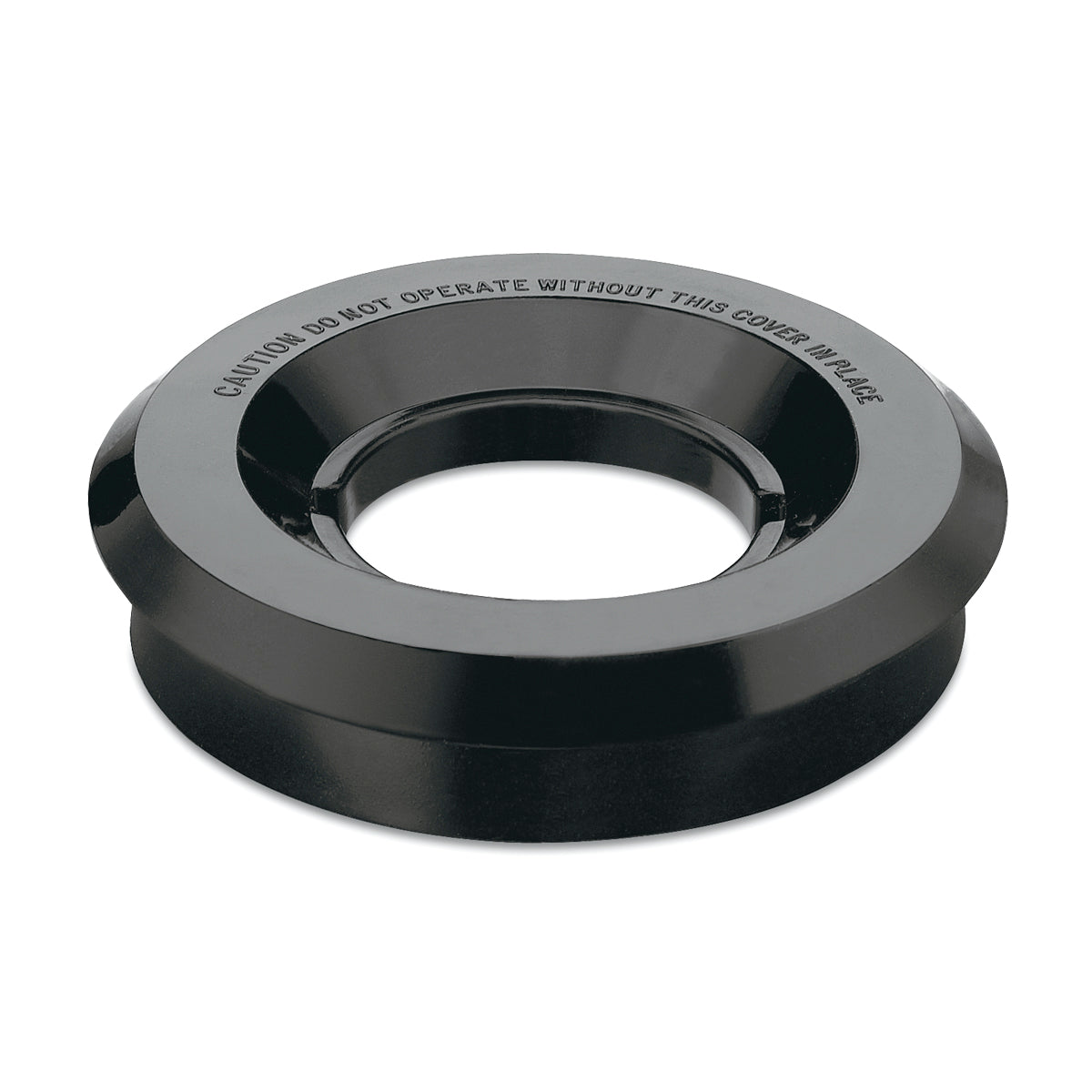 A black, circular plastic guard or outer lid with a wide rim and large central hole. Raised text around the rim reads: CAUTION DO NOT OPERATE WITHOUT THIS COVER IN PLACE. The item sits on a plain white background.