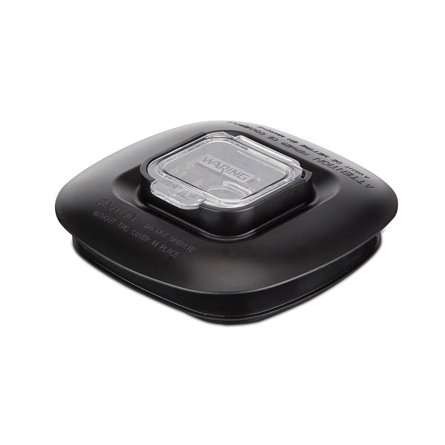 A black plastic, square-shaped BB300 series automotive fuel cap with rounded edges. It features a transparent rectangular window at the center, showing a label inside with “WARNING” and other text, plus embossed caution and safety instructions.