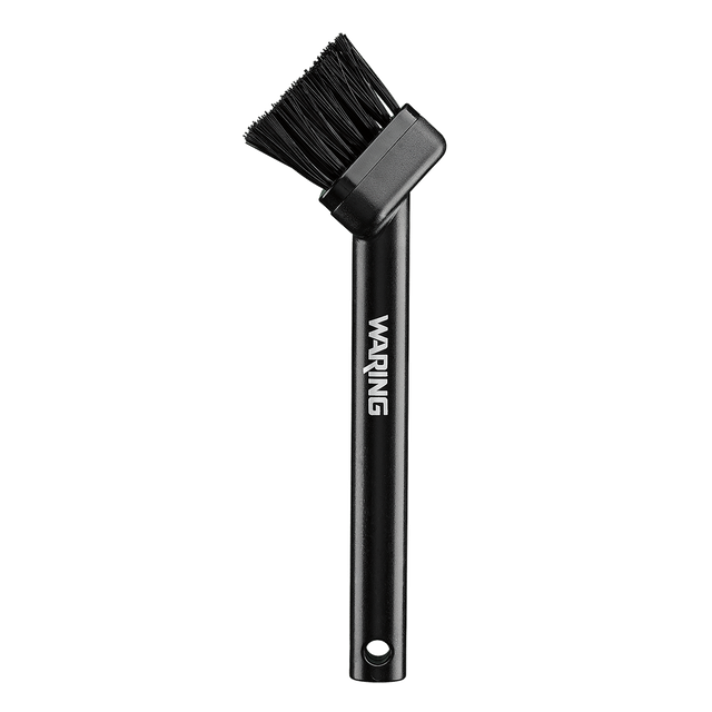 A black cleaning brush designed for waffle makers, featuring stiff bristles angled at 90 degrees from the handle. The handle has WARING printed in white letters and a convenient hole at the bottom for hanging. The background is light gray.