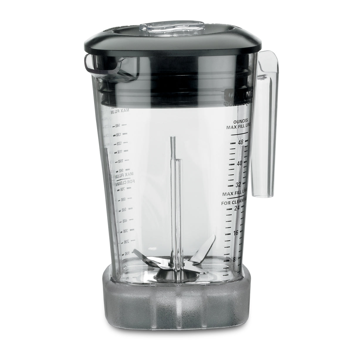A clear copolyester MX Series Blender Container with a black lid and handle, vertical measurement markings in ounces and milliliters, and steel blades at the bottom. The jar sits on a gray rubber base and is empty, showing all interior details.