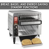 A high volume stainless steel toaster with control knobs and buttons on the left toasts two slices at a time. Above, bold text reads: BREAD, BAGEL, AND ENERGY-SAVING STANDBY FUNCTIONS. Perfect for commercial use.