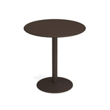 A simple, round, dark brown bistro bar table with a smooth top. It features a steel pedestal base and a flat, circular foot, all in matching dark brown. Perfect as an outdoor/indoor table, photographed against a plain white background.