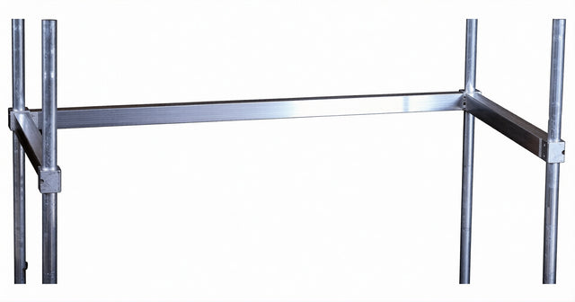 A close-up of an aluminum keg rack shows vertical and horizontal silver metal bars connected at right angles, forming a rectangular frame against a plain white background.