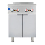 A stainless steel gas range commercial kitchen appliance with four red and white control knobs. Featuring two cabinet doors below and four cylindrical legs, its simple, functional design is ideal for restaurant or industrial kitchens.