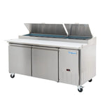 A commercial stainless steel sandwich or pizza prep table by Empura Refrigeration features two open top lids revealing ingredient compartments, two storage doors, a white cutting board surface, digital display, and four caster wheels for mobility.