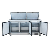 A large stainless steel commercial refrigeration unit with four doors open—two top lids and two front doors—reveals spacious interior storage and wire shelving. Mounted on wheels for mobility, it features a digital control panel on the bottom right.