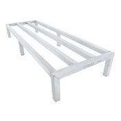 A heavy duty Empura dunnage rack with four horizontal slats, six square legs, and a rectangular shape. Designed for storing items off the ground in commercial kitchens or storage areas, it features durable stainless steel construction.