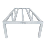 A stainless steel table frame with four legs and horizontal support bars, viewed from the front. The brand Empura is labeled at the center of the front support beam. This simple, industrial design complements any heavy duty aluminum rack setup.