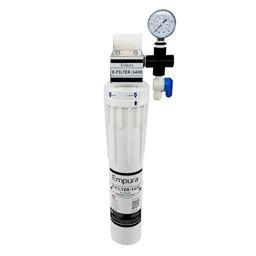 A white Empura E-Filter-1400 Water Filtration System features a cylindrical filter housing, a pressure gauge at the top, a blue shutoff valve, and connection ports—ideal for protecting commercial ice machines with built-in scale inhibitor technology.