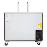 A commercial beer cooler with a stainless steel top, two tap towers, a silver front panel with labels and warnings, a visible black cooling unit at the bottom right, and four caster wheels—ideal as a direct draw beer dispenser.