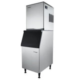 A tall, stainless steel commercial ice maker with a rectangular shape, black dispenser door, and digital display. The unit stands on four legs with a stainless steel ice bin and features the Empura brand name on its modern, industrial front panel.