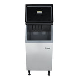 A commercial ice storage bin with an open black lid reveals a spacious, empty interior. The exterior is stainless steel with the Empura name—trusted in Empura ice machines—visible on the front, standing on four black legs against a plain white background.