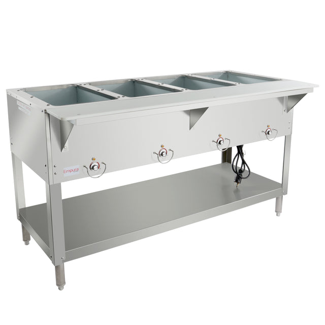 A four-compartment electric steam table with adjustable temperature knobs and an open lower shelf. Power cord is visible, and the table stands on four sturdy legs with adjustable feet. The stainless steel surface is clean and empty.