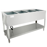 A rectangular stainless steel 4-well steam table with an open lower shelf for storage and adjustable legs. An electric cord hangs from the left side, indicating it’s a heated or electrically powered food service unit.