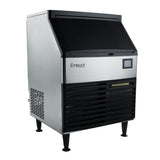 A commercial Empura undercounter ice machine with a stainless steel exterior, black vented lower front panel, angled black door, small control panel, and four legs. This modern, boxy full cube ice maker is ideal for industrial use.