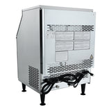 A silver commercial ice machine with a vented metal back panel, warning and instruction labels, black power cord, and four black legs. The power cord wraps around a hook on the back, and the undercounter appliance sits on a plain white background.