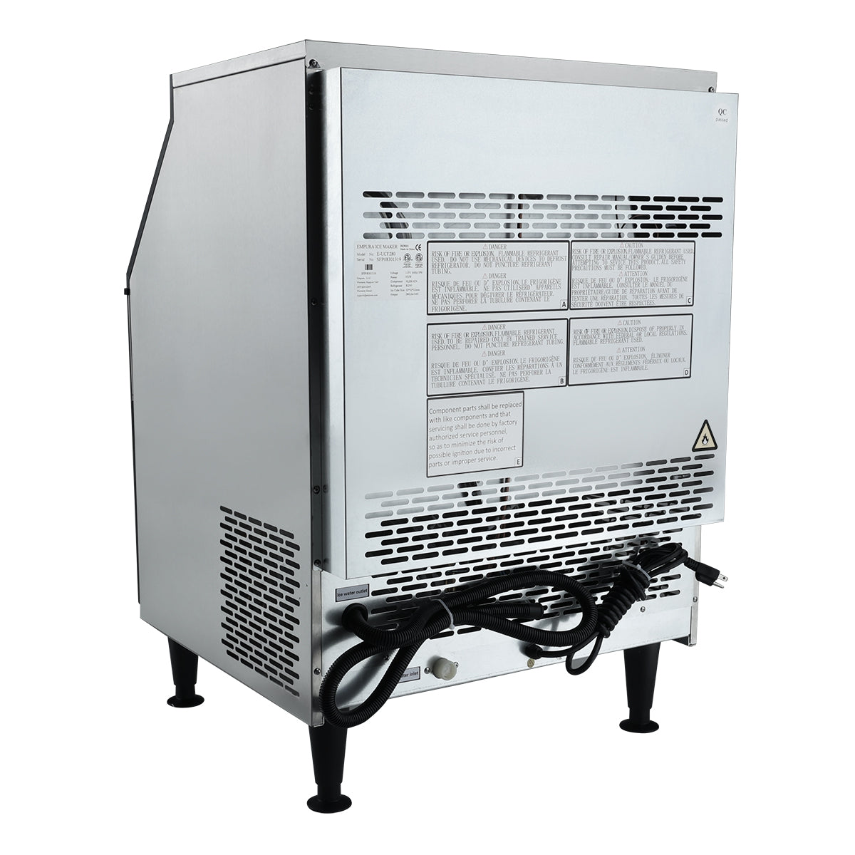 A stainless steel Empura ice machine viewed from the back, showing ventilation grilles, information labels, a warning symbol, a power cord coiled at the bottom, and four black legs supporting this commercial kitchen unit.