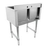 A stainless steel 2 compartment underbar sink with deep rectangular basins, an open front panel, and four sturdy legs with adjustable feet. Featuring two faucet holes at the back, it's ideal for industrial or kitchen use. The surface is clean and reflective.