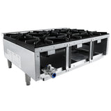 A stainless steel commercial gas stove with six black cast iron burners and cast iron top grates, control knobs, and sturdy metal legs. Its industrial design suits professional kitchens, with visible gas connections and burner supports.