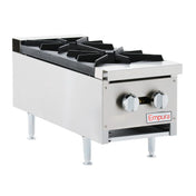 A close-up of a countertop gas hot plate highlights the sturdy design and efficiency perfect for any kitchen setup.