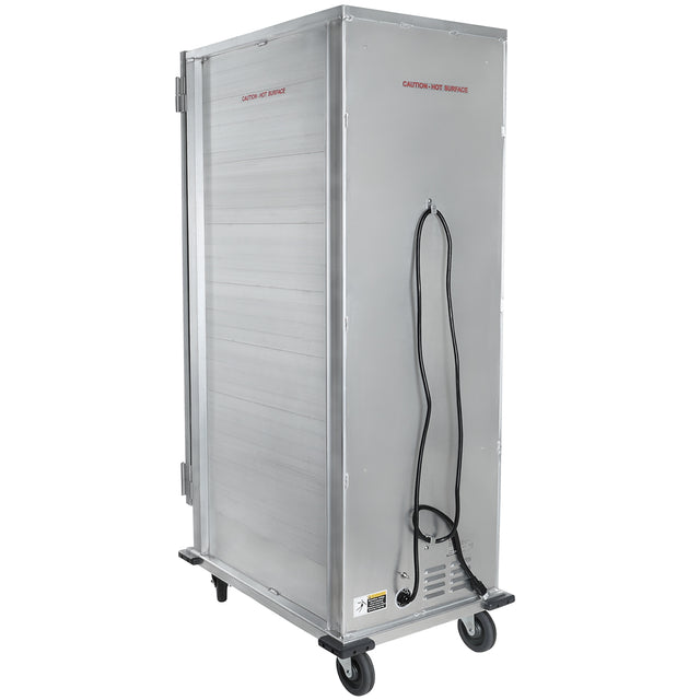 A full size, silver rectangular heating holding cabinet on four wheels with a 36 pan capacity, a black electrical cord hanging on the side, and warning labels including a red "Caution—Hot Surface" sign. It has a plain, industrial appearance.