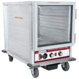 A stainless steel Empura Proofing Cabinet on wheels featuring a front glass door, multiple interior shelves with 12 pan capacity, three control knobs, power switch, and caution labels. Ideal for heating and proofing food.