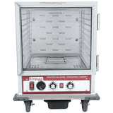A half size stainless steel proofers and heated cabinet by Empura with a glass door, control knobs, a temperature gauge, and warning label. It stands on four wheels, features metal shelves inside, a removable tray at the bottom, and 12 pan capacity.