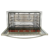 A stainless steel convection oven with its glass door open reveals three wire racks inside. The control panel below the door has red and green buttons and labeled dials. Two fans on the back wall ensure even cooking.