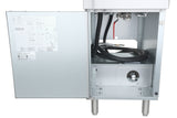 An open metal electrical control box for a Commercial Electric Fryer reveals internal wiring, a coiled black cable, a rotary dial, and a diagram with labeled instructions inside the door. The box stands on metal legs and has a silver finish.