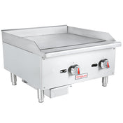 A stainless steel Empura countertop griddle with raised sides, two control knobs, and sturdy legs. The smooth, flat surface is ideal for cooking, and a small grease tray sits underneath this versatile natural gas griddle.