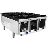 A commercial stainless steel single-burner gas hot plate with four heavy-duty cast iron top grates, cylindrical metal legs, and a blue gas valve on the front, shown from an angled side view for countertop installation against a white background.