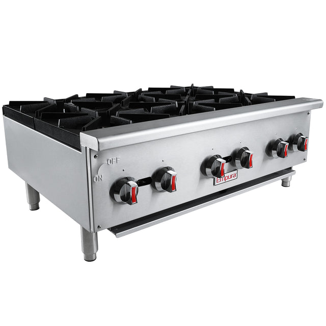 A commercial stainless steel gas countertop stove with six black cast iron top grates, red and black control knobs, and sturdy metal legs. The front panel features ON/OFF labels and a central brand logo. Ideal for countertop installation, shown at a slight angle.