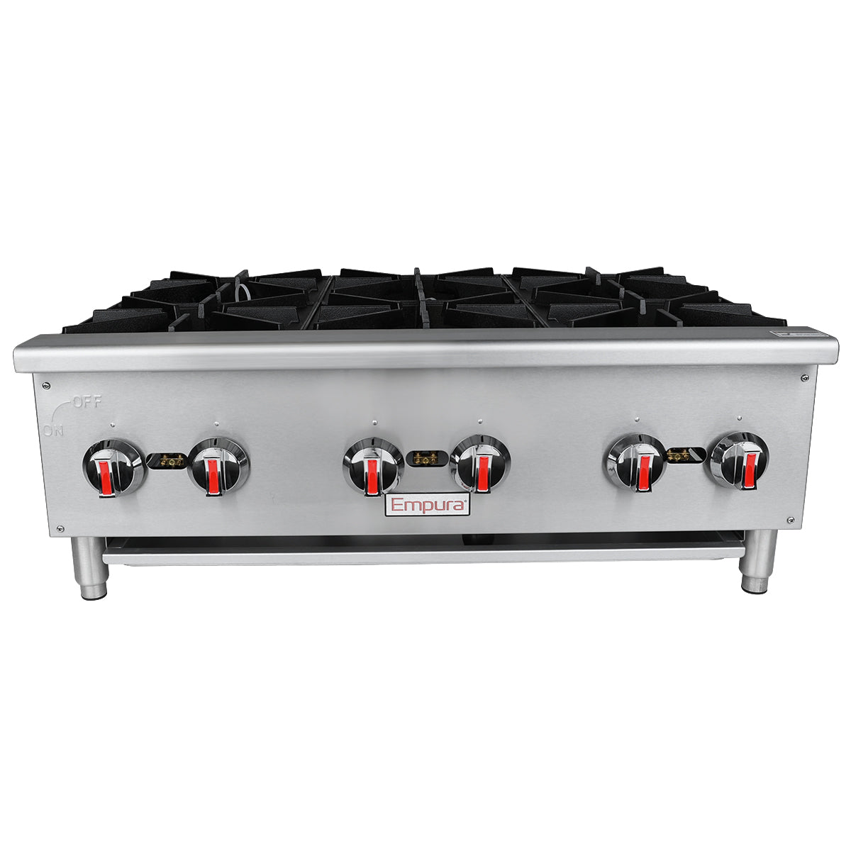 A stainless steel commercial gas hot plate with six cast iron top grates, six control knobs with red and black markings, and short cylindrical legs. The front panel displays the Empura brand. Ideal for countertop installation, stove is viewed from the front.