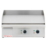 A clean Empura griddle built from stainless steel features raised sides and back, two control knobs, indicator lights, and a left-side drawer—ideal as an electric countertop griddle for any commercial kitchen.